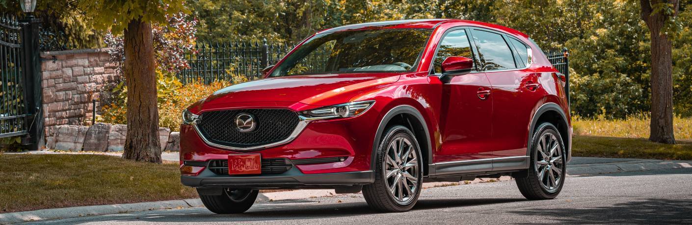 2020 Mazda CX-5 parked curbside by arboretum
