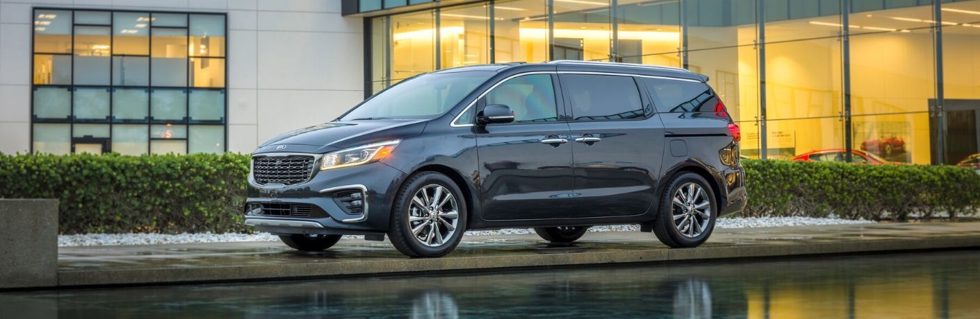 Exterior view of a blue 2020 Kia Sedona