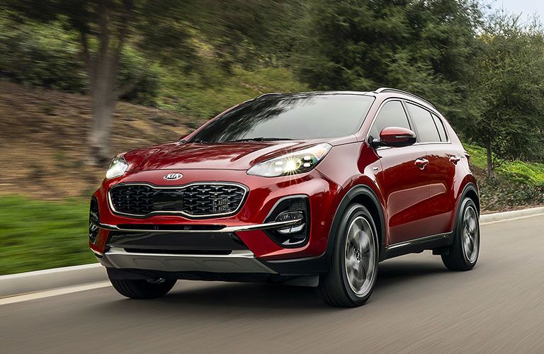 Exterior view of the front of a red 2020 Kia Sportage