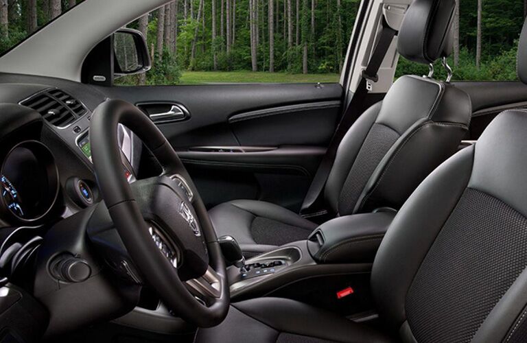 2019 Dodge Journey interior side shot of front seating design and upholstery