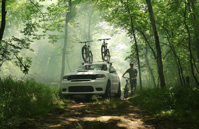 A photo of the 2020 Dodge Durango parked in the woods.
