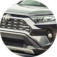 closeup of 2020 Toyota RAV4 front grille and headlight