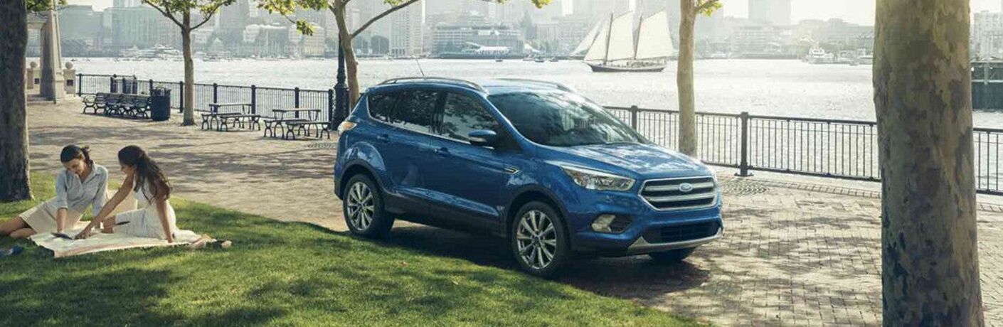 2018 Ford Escape on sidewalk with girls at picnic