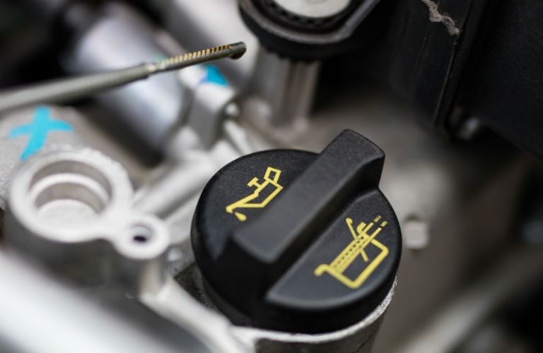 Oil dipstick on car engine