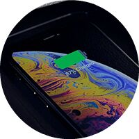 phone being charged with Qi-compatible wireless charging in 2020 Toyota Prius