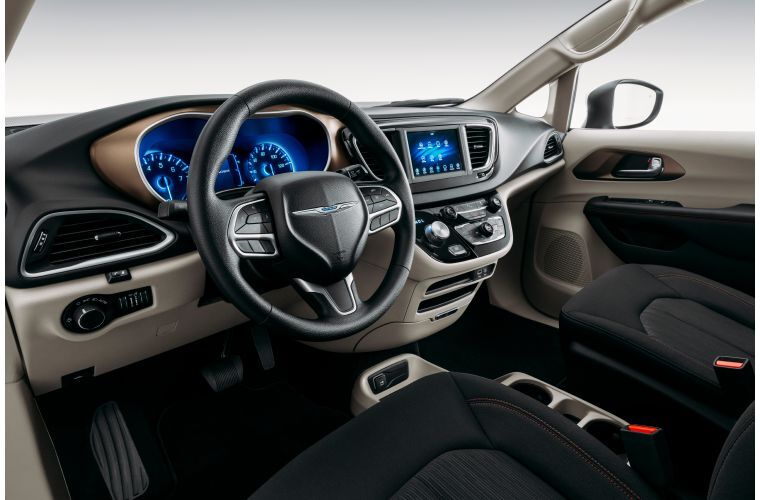 2020 Chrysler Voyager interior shot of front seating, controls, and dashboard layout