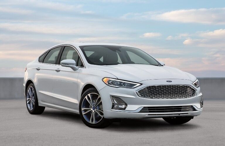 Front passenger angle of a white 2020 Ford Fusion