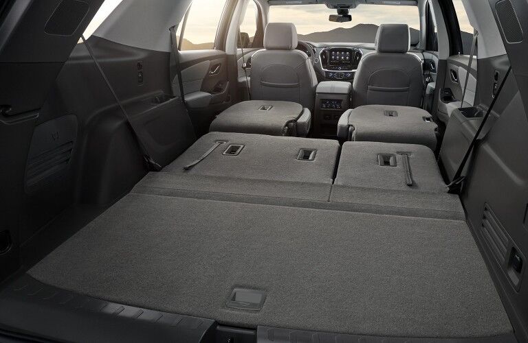 Rear angle of the interior of the 2020 Chevrolet Traverse with the seats folded down