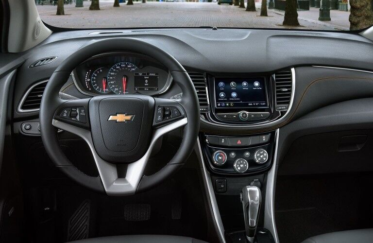 Close up of the steering wheel and dashboard inside the 2020 Chevrolet Trax